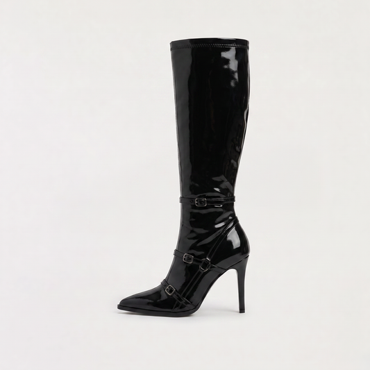 Black knee high boots featuring a sleek patent finish, inner zip closure, and stylish buckled straps, designed with elegant stiletto heels for women. 0