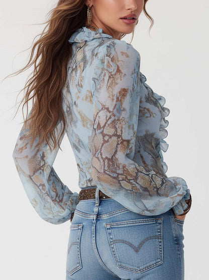 Kyra – Ruffled blouse with zipper in soft blue 1