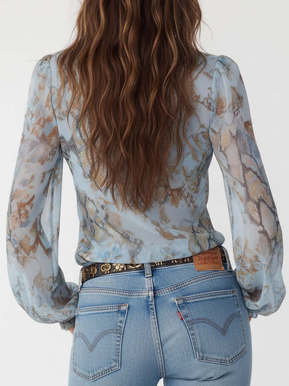 Kyra – Ruffled blouse with zipper in soft blue 3