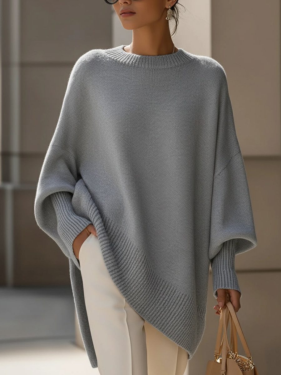 Oversized knit poncho jumper with batwing sleeves