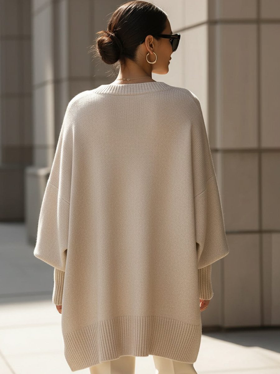 Oversized knit poncho jumper with batwing sleeves
