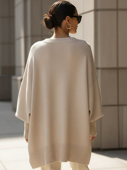 Oversized knit poncho jumper with batwing sleeves