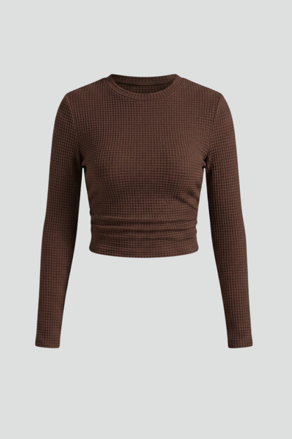 Chic textured crop top with sleeves studio shot